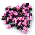 Size 00 pink black color capsule shell